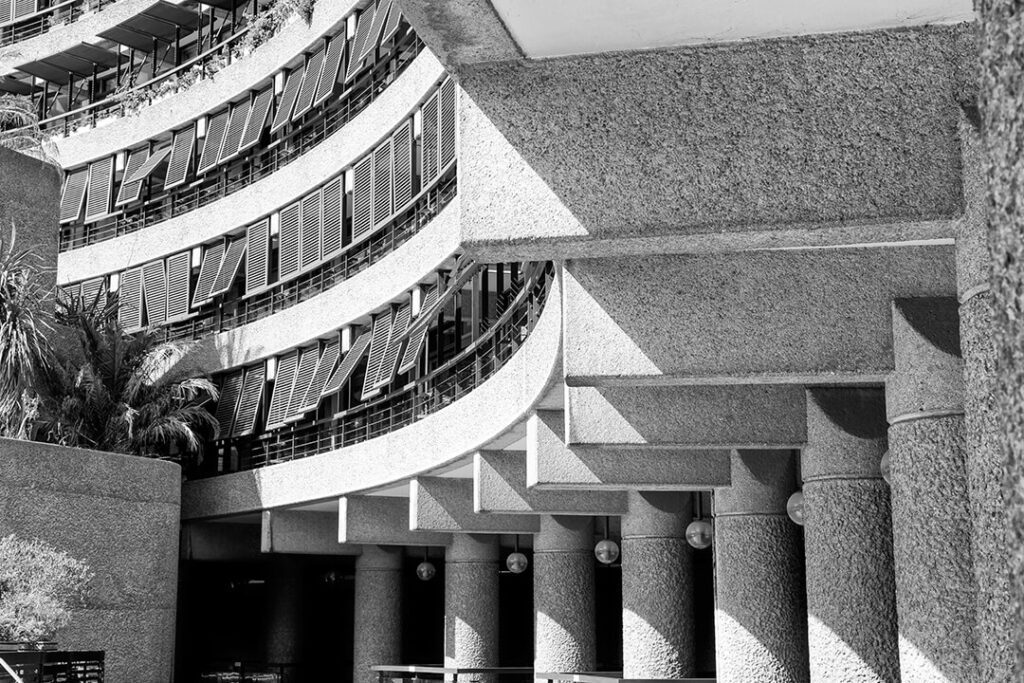 A black and white image featuring brutalist architecture in London