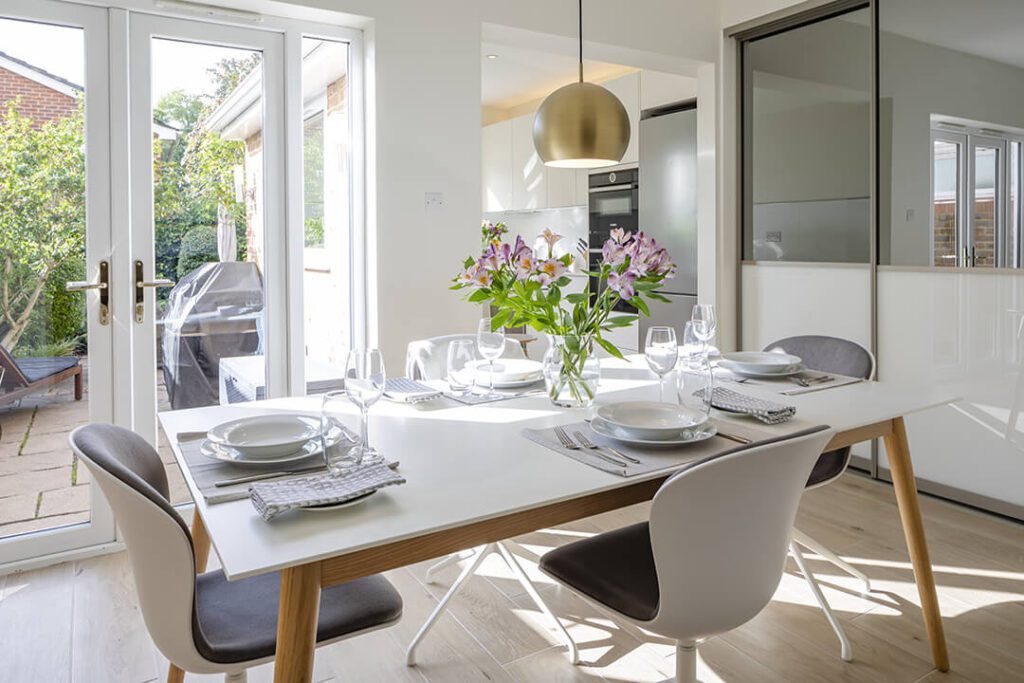 Modern bright and airy dining room. Professional interior photograph by Andrew Boschier